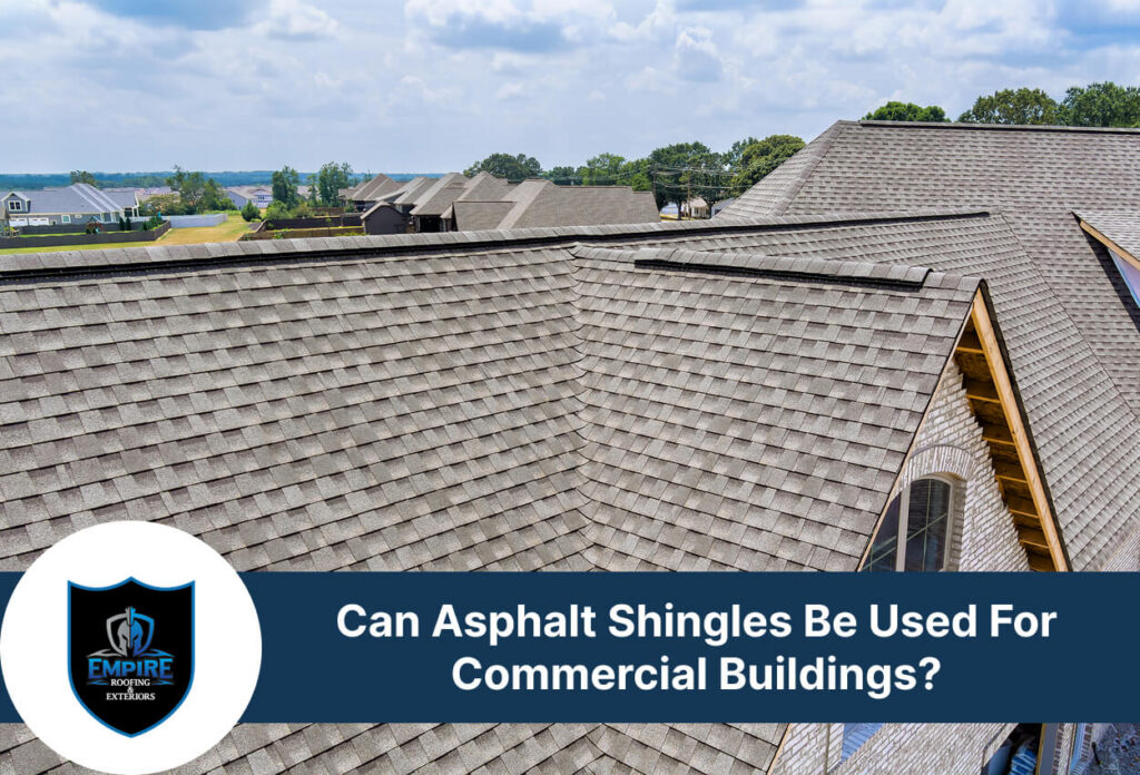 Asphalt shingles on residential roofs under a blue sky.